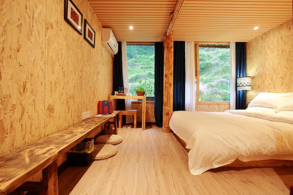 Tong Sang Art Hotel Liping Quarto foto