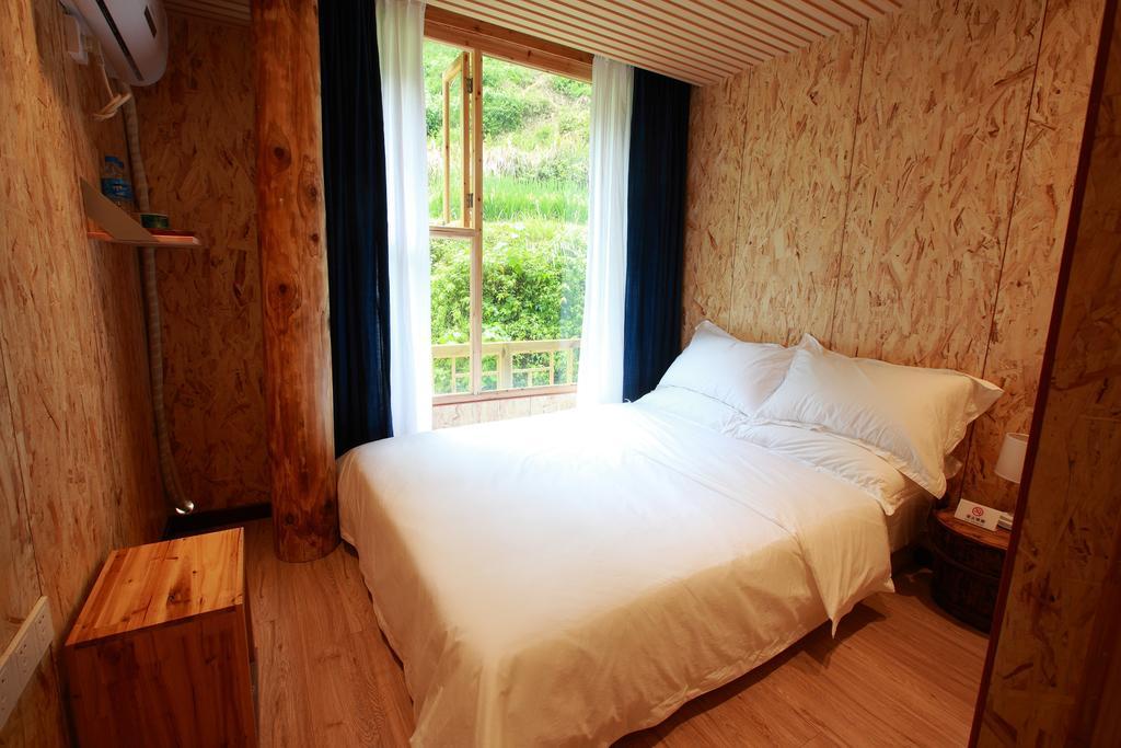 Tong Sang Art Hotel Liping Quarto foto